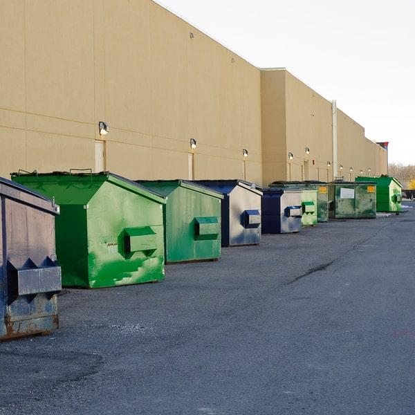 metal commercial waste container with waste disposal signage